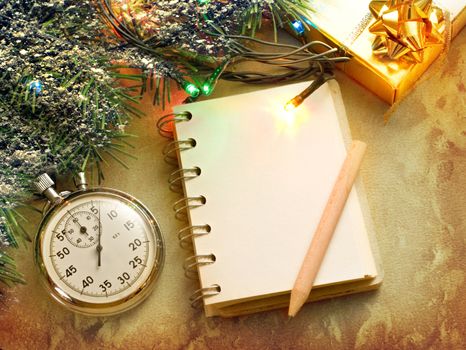 Christmas tree, stopwatch, gift and notepad