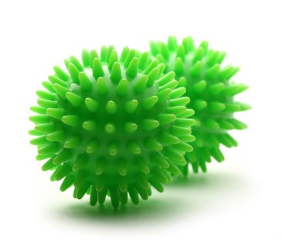 Two massage balls on white