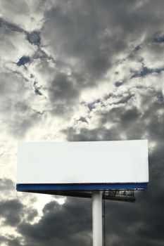 Blank street billboard on cloudy sky