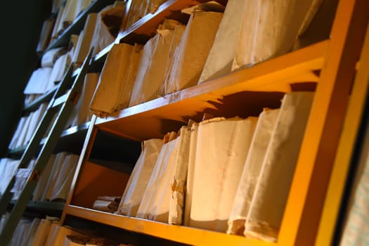 Shelves with paper document in archive