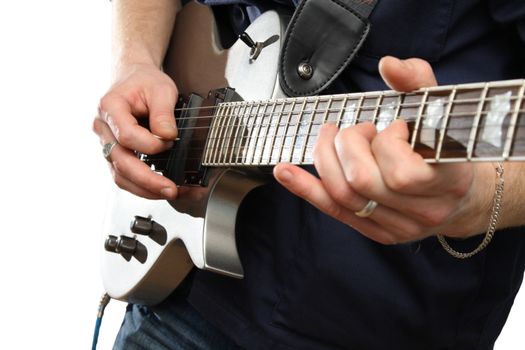 Electric guitar in male hands