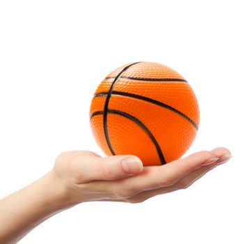 Female hand with small basketball