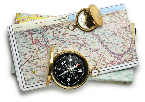 Road map plan and compass on white