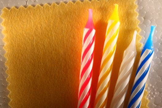 Blank yellow card and candles