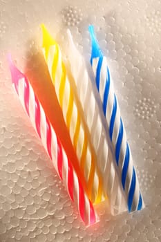 Bright candles on foam plastic