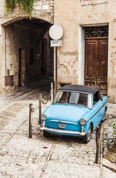 old style italian car in a village in Central Italy