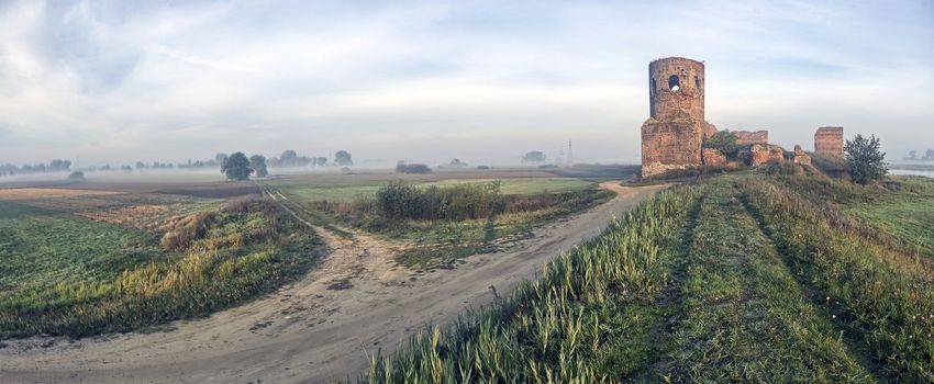 The fortified medieval castle with tower in Kolo city