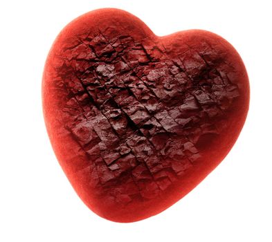 Red stone heart on white