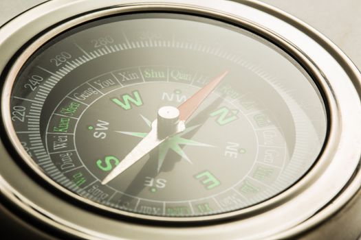Compass closeup in light toning