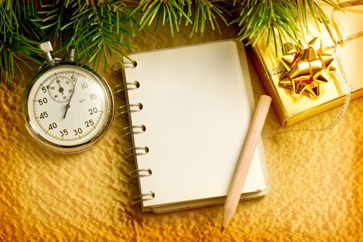 Christmas tree, stopwatch, gift and notepad