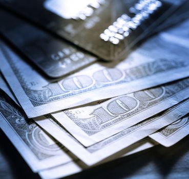 Credit cards and dollars in cash