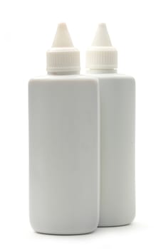 Plastic bottles on white background