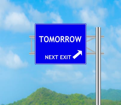 Road Sign concept to Tomorrow and Sky background.