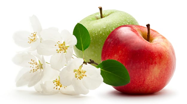Apples and flower on the white background