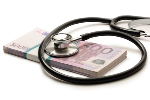 Stethoscope and euro banknotes cash closeup