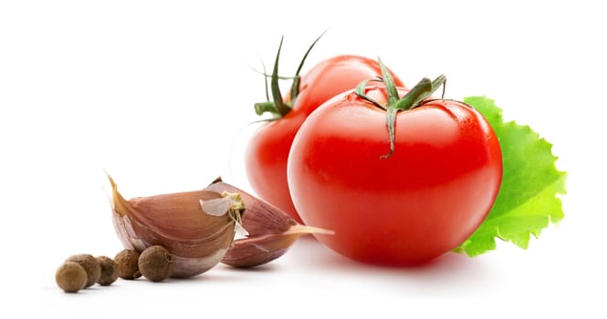 Tomatoes, onion and pepper on white background