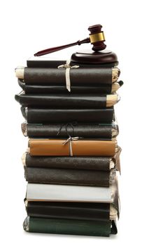 Stack of old paper folders and gavel