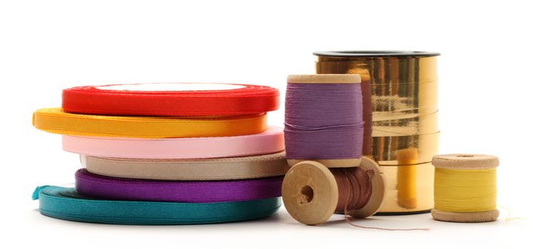 Thread bobbins and reels of ribbon