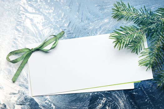 Invitation card on white snow