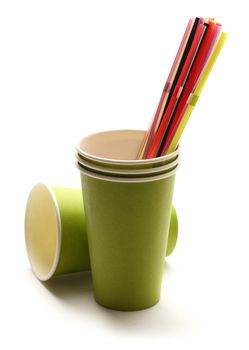 Green paper cups with straws