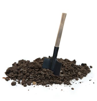 Soil and shovel on white