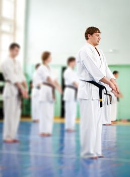 Lesson in karate school for adults and children