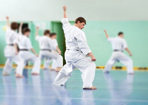 Lesson in karate school for adults and children