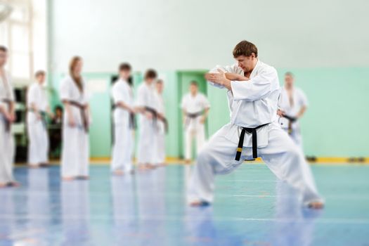 Lesson in karate school for adults and children