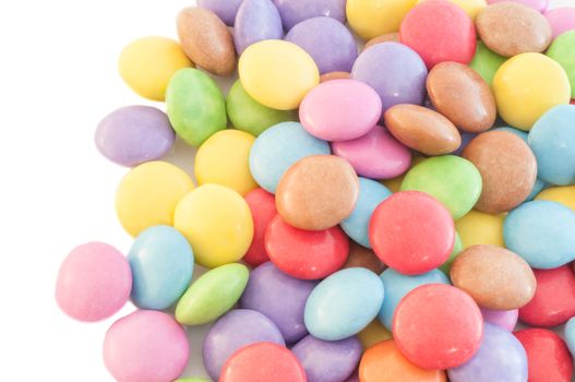 beautiful background of circular colored and various candy or pills