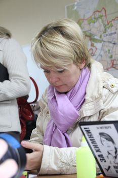 Khimki, Moscow region, Russia - October 14, 2012. Candidate for mayor of Khimki opposition leader Yevgeniya Chirikova in his campaign headquarters. On election day in the suburban town of Khimki broke sharp competition between the candidate of the Kremlin Oleg Shahov and representative opposition Yevgenia Chirikova.