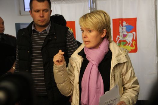 Khimki, Moscow region, Russia - October 14, 2012. Candidate for mayor of Khimki opposition leader Yevgeniya Chirikova during a visit to one of the polling stations. On election day in the suburban town of Khimki broke sharp competition between the candidate of the Kremlin Oleg Shahov and representative opposition Yevgenia Chirikova