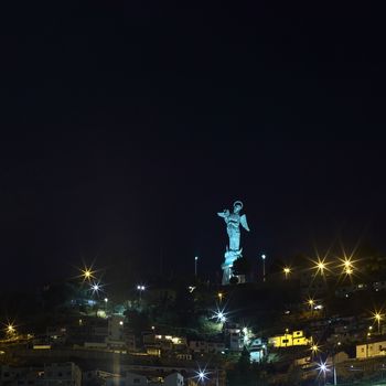 QUITO, ECUADOR - AUGUST 8, 2014: La Virgen de El Panecillo statue in the city center photographed at night on August 8, 2014 in Quito, Ecuador. Quito is an UNESCO World Cultural Heritage Site.