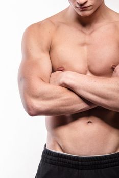 Muscular man with crossed hands - studio shoot 