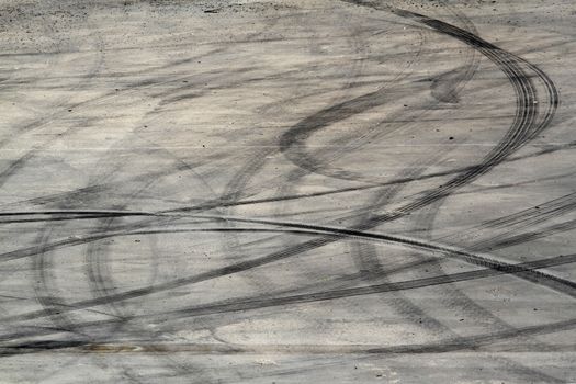 Background with tire marks on road track