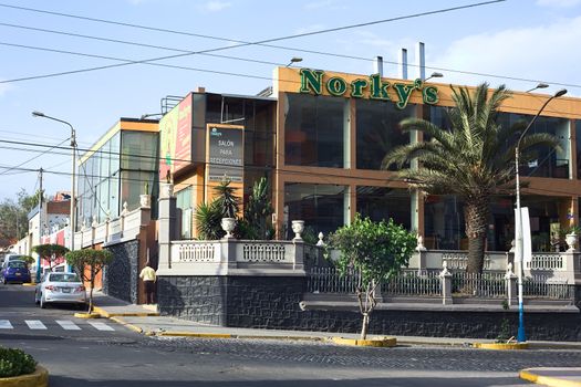 AREQUIPA, PERU - SEPTEMBER 7, 2014: Norky's roast chicken fast food restaurant on the corner of Ejercito avenue and Misti street on September 7, 2014 in Arequipa, Peru. Broiler is very popular in Peru.