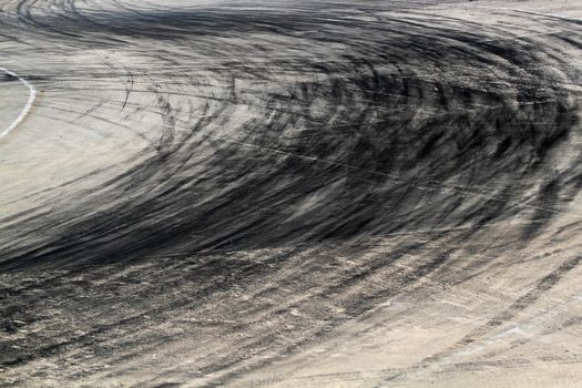 Background with tire marks on road track