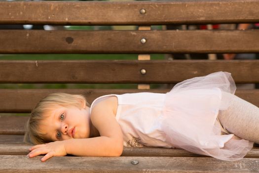 Outdoor portrait  of cute little girl in summer day