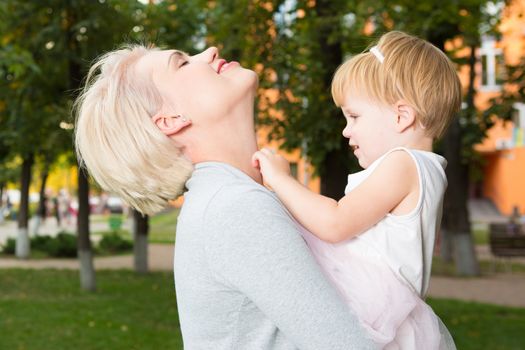 Portrait of a mother with her 2 years old child