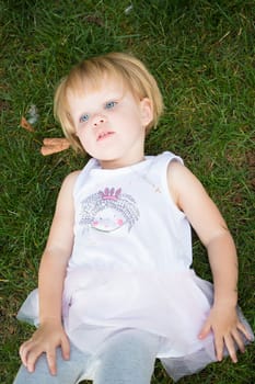 Outdoor portrait  of cute little girl in summer day