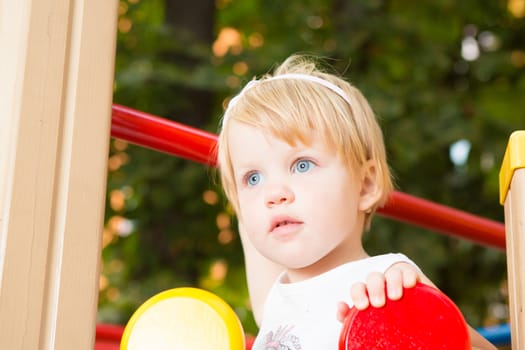 Outdoor portrait  of cute little girl in summer day