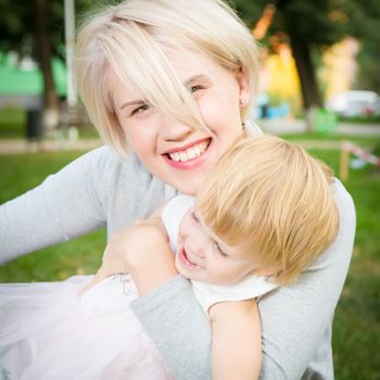 portrait of beautiful mother and kid girl