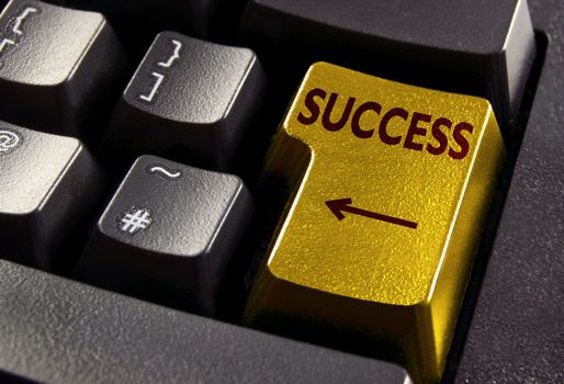 Gold computer enter key with success 