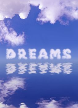 Dreams text cloud reflecting in a pool of water 