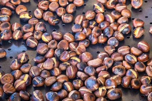 Grilled chestnuts being selled at stalls in autumn.