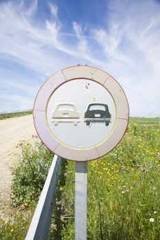 no overtake old road signal in a landscape from Spain