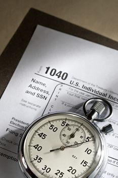 Tax form and stopwatch 