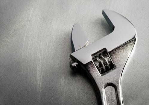 Spanner on the steel background