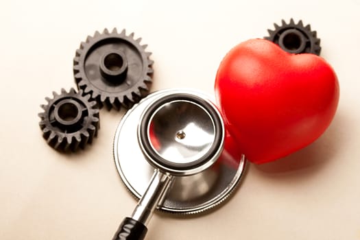 Mechanical ratchets, stethoscope and red heart 