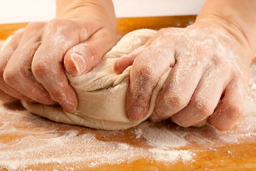 Kneading the dough with hands