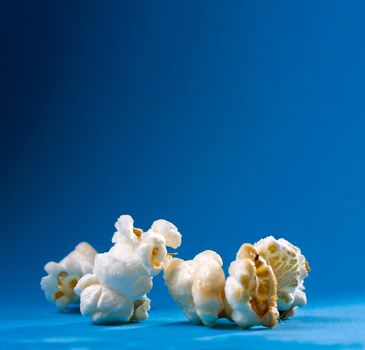 Popcorn on the blue background